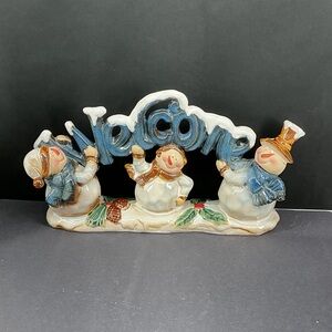 Festive Snowman “Welcome” table decoration.